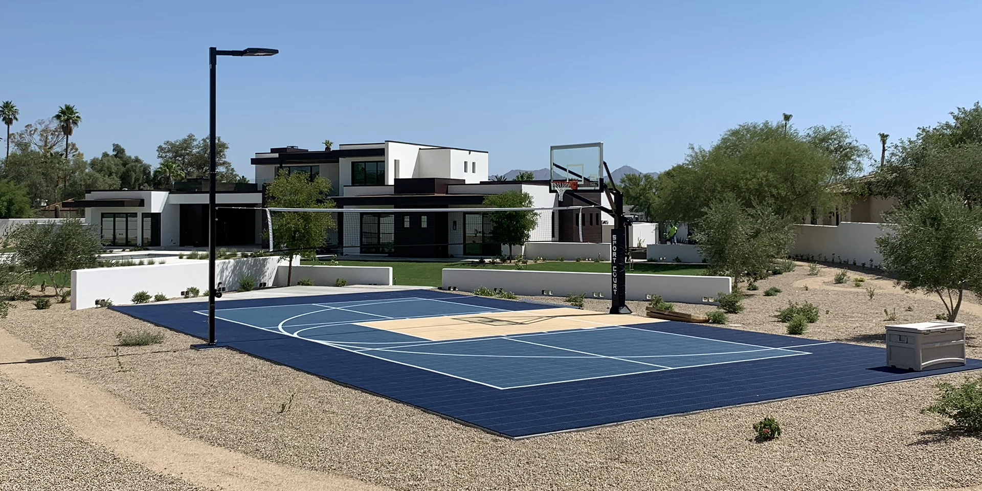 multi sport court surrounded by gravel