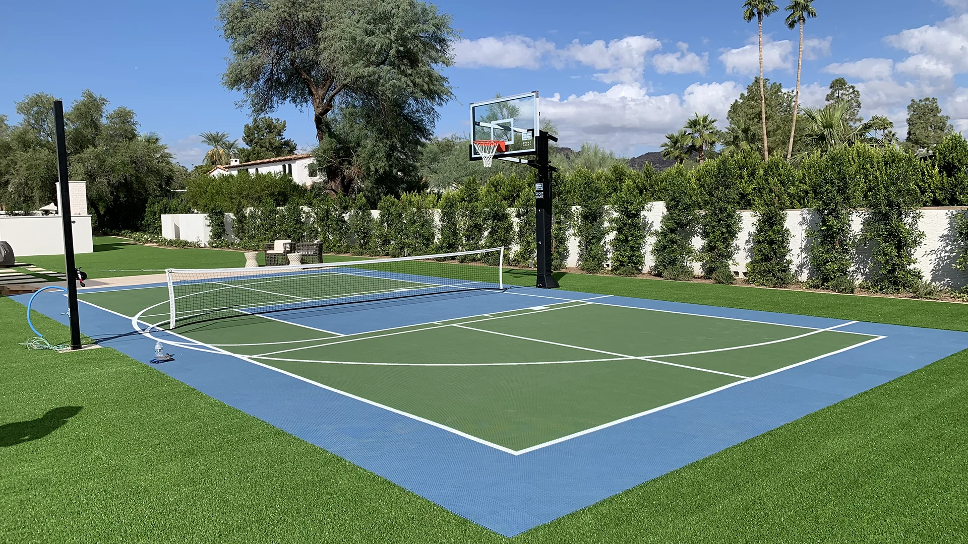 Multi-sport court installation with turf